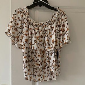 Cream short sleeve shirt with orange and black floral design size medium